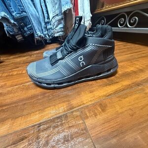 On Running with Black Athletic Shoes